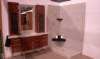 solidsurfaceshowerandmatchingvanitytop1172_small.jpg