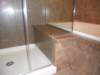 solidsurfaceshowercustomglassenclosure_small.jpg