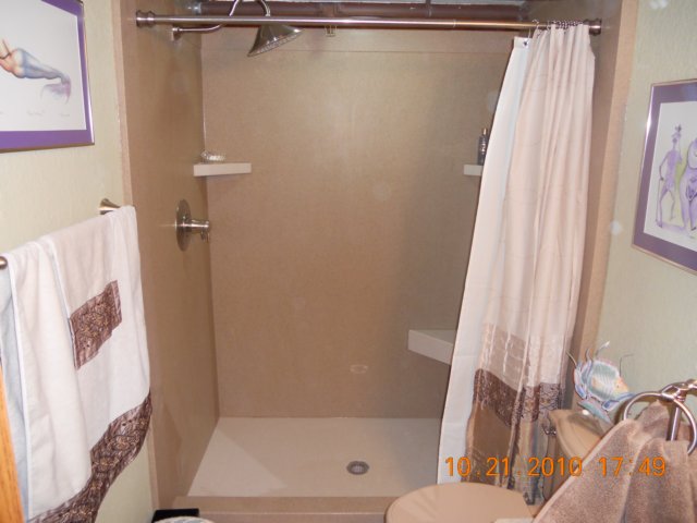 solidsurfaceshowerpanandwalls.jpg